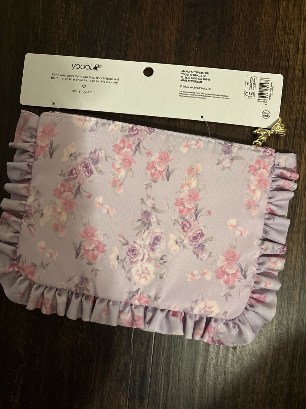Yoobi Lavender Floral Ruffle Pouch with Pink Accents from love shack fancy